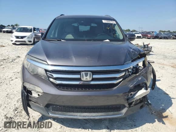 2018 Honda Pilot Elite с VIN 5FNYF6H0XJB055566, выставлен на аукционе Copart как лот 71006755 с пробегом 83 177 миль миль и Списание • Salvage title. История ставок и продаж доступна на DreamBid. Изображение 5.