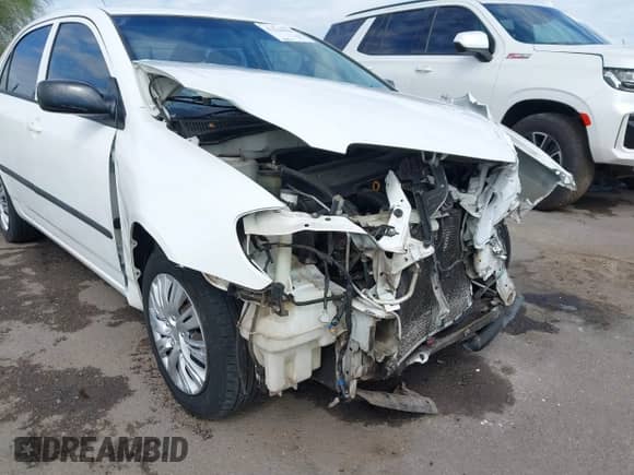 2004 Toyota Corolla CE z VIN JTDBR32E742037694, wystawiony jako IAAI lot #43246589 z przebiegiem 90 231 mil mil oraz . Historia ofert i sprzedaży dostępna na DreamBid. Obrazek 17.