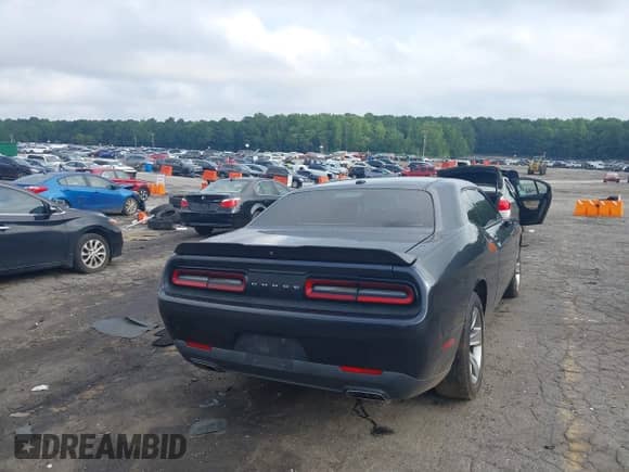 2019 Dodge Challenger SXT with VIN 2C3CDZAG9KH531752, listed as a IAAI auction lot 42800857 with 140,000 mi miles and . Bid and sale history available at DreamBid. Image 4.