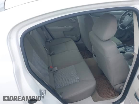 2009 Dodge Avenger SE with VIN 1B3LC46B59N509605, listed as a IAAI auction lot 42660812 with 45,495 mi miles and . Bid and sale history available at DreamBid. Image 8.