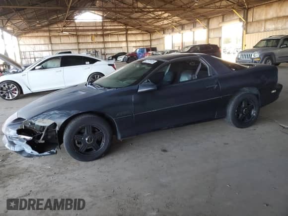 1995 Chevrolet Camaro Z28 z VIN 2G1FP22P9S2148783, wystawiony jako Copart lot #42178135 z przebiegiem 216 461 mil mil oraz Szkoda całkowita • Salvage title. Historia ofert i sprzedaży dostępna na DreamBid. Obrazek 1.