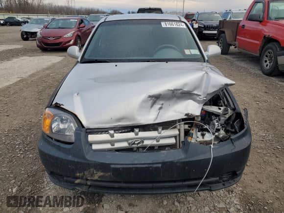 2004 Hyundai Accent GL z VIN KMHCG35C64U279929, wystawiony jako Copart lot #81661824 z przebiegiem 99 222 mil mil oraz Szkoda całkowita • Salvage title. Historia ofert i sprzedaży dostępna na DreamBid. Obrazek 5.