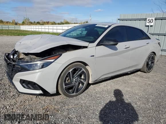 2021 Hyundai Elantra N Line z VIN KMHLR4AF3MU133178, wystawiony jako Copart lot #86449595 z przebiegiem 153 943 mil mil oraz Szkoda całkowita • Salvage title. Historia ofert i sprzedaży dostępna na DreamBid. Obrazek 1.