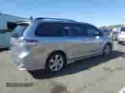 2014 Toyota Sienna SE with VIN 5TDXK3DC5ES418119, listed as a Copart auction lot 70915875 with 115,073 mi miles and Salvage title. Bid and sale history available at DreamBid. Image 3.
