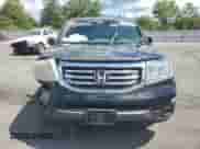 2014 Honda Pilot LX с VIN 5FNYF4H29EB015488, выставлен на аукционе Copart как лот 69835925 с пробегом 173 325 миль миль и Списание • Salvage title. История ставок и продаж доступна на DreamBid. Изображение 5.