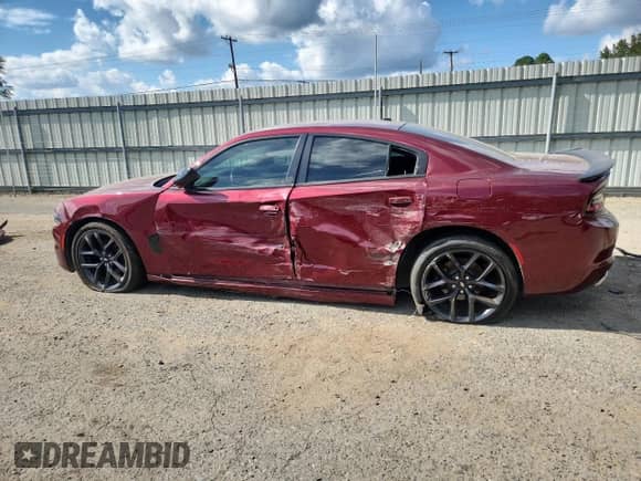 2019 Dodge Charger SXT with VIN 2C3CDXBG7KH504858, listed as a Copart auction lot 84907825 with 169,734 mi miles and Salvage title. Bid and sale history available at DreamBid. Image 2.