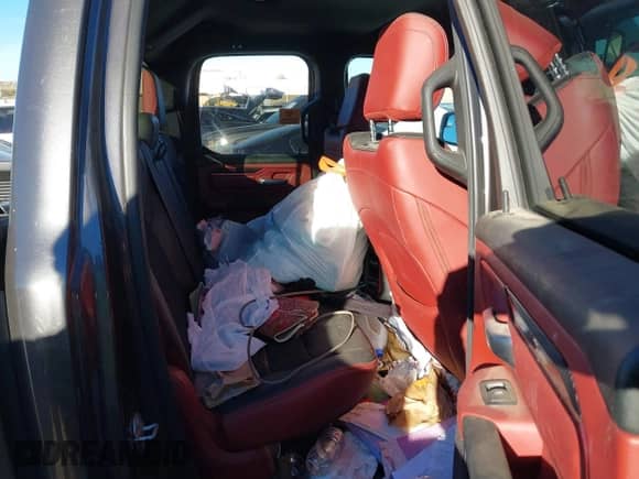 2019 Ram 1500 Rebel with VIN 1C6RRFEG6KN860990, listed as a IAAI auction lot 40904536 with 121,670 mi miles and . Bid and sale history available at DreamBid. Image 8.