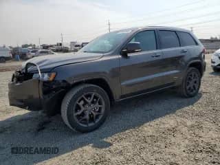 2021 Jeep Grand Cherokee 80th Anniversary with VIN 1C4RJFBG2MC580521, listed as a Copart auction lot 71565465 with 48,461 mi miles and Salvage title. Bid and sale history available at DreamBid. Image 1.