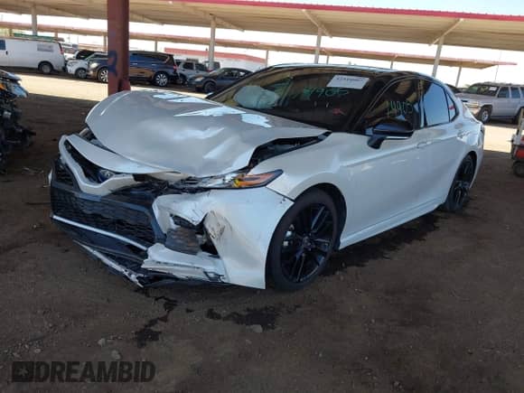 2022 Toyota Camry Hybrid XSE с VIN 4T1K31AK8NU040859, выставлен на аукционе IAAI как лот 42444007 с пробегом 97 430 миль миль и . История ставок и продаж доступна на DreamBid. Изображение 2.