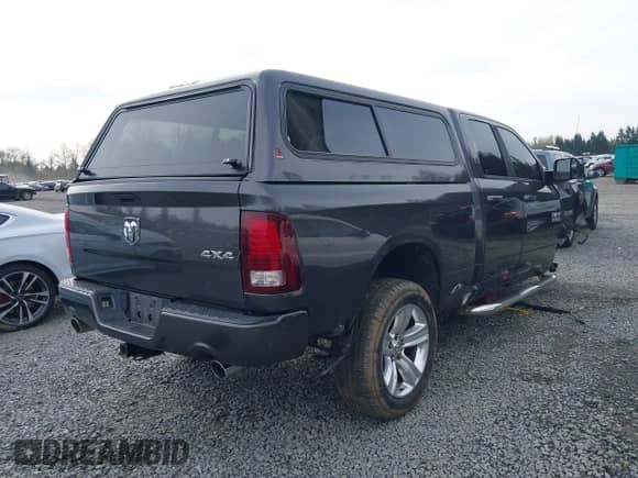 2014 Ram 1500 Sport with VIN 1C6RR7HT0ES196738, listed as a IAAI auction lot 41980272 with 161,099 mi miles and . Bid and sale history available at DreamBid. Image 4.