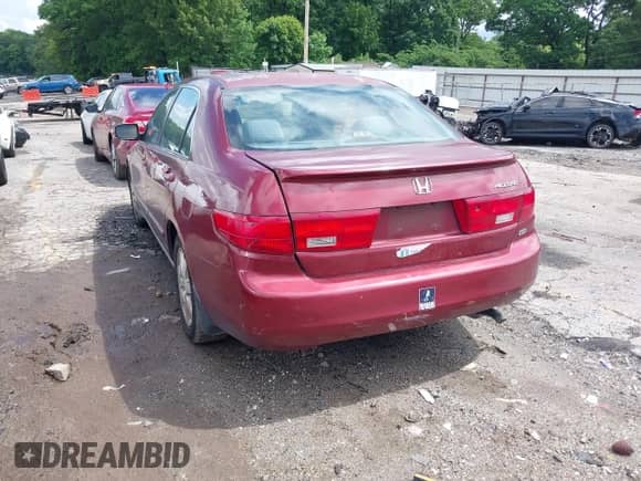 2005 Honda Accord LX with VIN 1HGCM663X5A028932, listed as a IAAI auction lot 42247000 with 214,846 mi miles and . Bid and sale history available at DreamBid. Image 3.