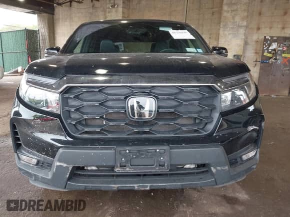 2023 Honda Passport EX-L with VIN 5FNYF8H52PB033173, listed as a IAAI auction lot 42376245 with 24,134 mi miles and . Bid and sale history available at DreamBid. Image 12.