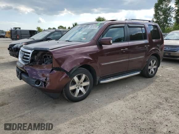 2012 Honda Pilot Touring with VIN 5FNYF4H97CB503767, listed as a Copart auction lot 80635235 with 210,515 mi miles and Salvage title. Bid and sale history available at DreamBid. Image 1.