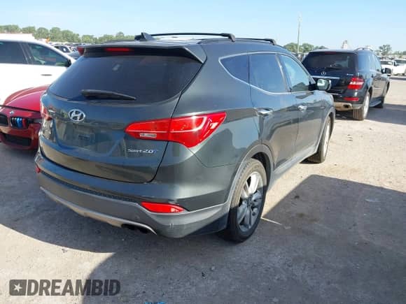 2013 Hyundai Santa Fe Sport z VIN 5XYZU3LA4DG117551, wystawiony jako IAAI lot #42775461 z przebiegiem 165 853 mil mil oraz . Historia ofert i sprzedaży dostępna na DreamBid. Obrazek 4.