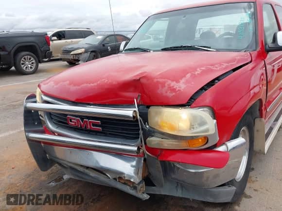 2000 GMC Sierra 1500 SLE z VIN 1GTEC19T4YZ165637, wystawiony jako IAAI lot #42532810 z przebiegiem 180 104 mil mil oraz . Historia ofert i sprzedaży dostępna na DreamBid. Obrazek 6.