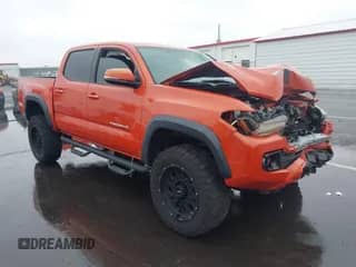 2017 Toyota Tacoma TRD Off Road z VIN 5TFCZ5AN3HX056866, wystawiony jako IAAI lot #43322918 z przebiegiem 125 733 mil mil oraz . Historia ofert i sprzedaży dostępna na DreamBid. Obrazek 1.