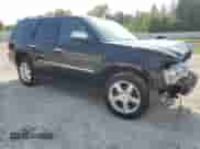 2011 Chevrolet Tahoe LTZ z VIN 1GNSKCE09BR177990, wystawiony jako Copart lot #81012815 z przebiegiem 194 704 mil mil oraz Szkoda całkowita • Salvage title. Historia ofert i sprzedaży dostępna na DreamBid. Obrazek 4.