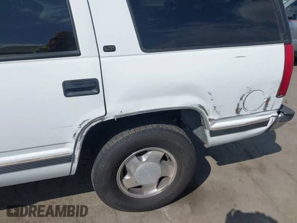 1997 Chevrolet Tahoe with VIN 1GNEK13RXVJ428831, listed as a IAAI auction lot 43348161 with 162,463 mi miles and . Bid and sale history available at DreamBid. Image 12.