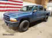 2003 Dodge Dakota Sport z VIN 1D7HG38X33S149289, wystawiony jako Copart lot #72442394 z przebiegiem 164 177 mil mil oraz Czysty tytuł • Clean title. Historia ofert i sprzedaży dostępna na DreamBid. Obrazek 1.