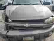 2005 Chevrolet TrailBlazer LS с VIN 1GNDS13S352155059, выставлен на аукционе Copart как лот 61207175 с пробегом Не указан миль и Списание • Salvage title. История ставок и продаж доступна на DreamBid. Изображение 12.