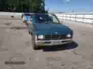 1995 Nissan Frontier z VIN 1N6SD11S3SC475028, wystawiony jako Copart lot #67705745 z przebiegiem 456 829 mil mil oraz Szkoda całkowita • Salvage title. Historia ofert i sprzedaży dostępna na DreamBid. Obrazek 13.