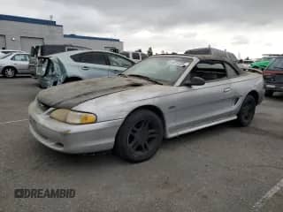 1998 Ford Mustang GT z VIN 1FAFP45X8WF275856, wystawiony jako Copart lot #80315305 z przebiegiem 197 038 mil mil oraz Czysty tytuł • Clean title. Historia ofert i sprzedaży dostępna na DreamBid. Obrazek 1.