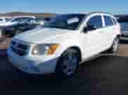 2009 Dodge Caliber SXT with VIN 1B3HB48C29D181709, listed as a IAAI auction lot 41425090 with 147,557 mi miles and . Bid and sale history available at DreamBid. Image 2.