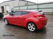 2014 Hyundai Veloster z VIN KMHTC6ADXEU216720, wystawiony jako Copart lot #67971295 z przebiegiem 81 777 mil mil oraz Szkoda całkowita • Salvage title. Historia ofert i sprzedaży dostępna na DreamBid. Obrazek 2.