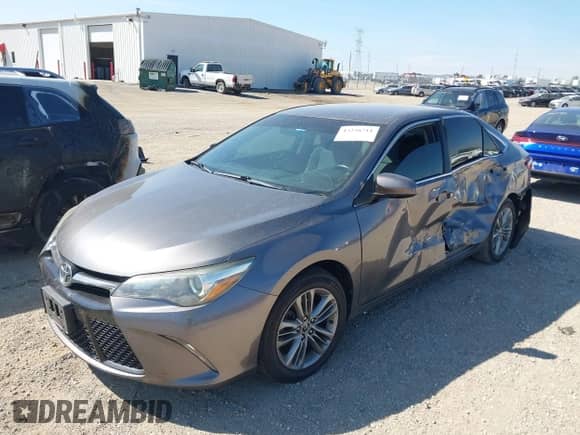 2015 Toyota Camry LE z VIN 4T1BF1FK3FU088867, wystawiony jako IAAI lot #43238711 z przebiegiem 185 010 mil mil oraz . Historia ofert i sprzedaży dostępna na DreamBid. Obrazek 17.