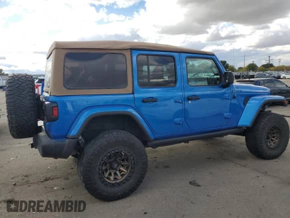 2021 Jeep Wrangler Unlimited Sahara High Altitude with VIN 1C4HJXEM3MW770622, listed as a Copart auction lot 76144874 with 71,886 mi miles and Salvage title. Bid and sale history available at DreamBid. Image 3.
