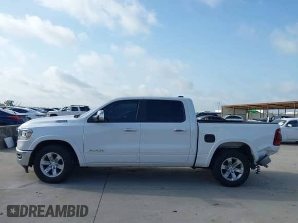 2019 Ram 1500 Laramie z VIN 1C6RREJTXKN743443, wystawiony jako IAAI lot #42539927 z przebiegiem 95 220 mil mil oraz . Historia ofert i sprzedaży dostępna na DreamBid. Obrazek 15.