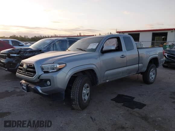 2018 Toyota Tacoma SR with VIN 5TFRX5GN8JX117075, listed as a IAAI auction lot 41723001 with 67,559 mi miles and . Bid and sale history available at DreamBid. Image 2.