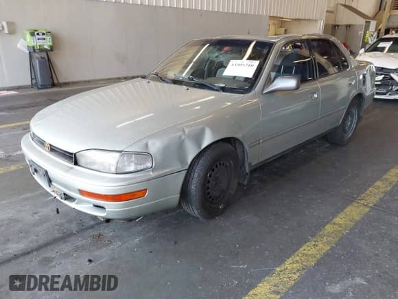 1994 Toyota Camry LE z VIN 4T1SK12EXRU336239, wystawiony jako IAAI lot #43305210 z przebiegiem 184 899 mil mil oraz . Historia ofert i sprzedaży dostępna na DreamBid. Obrazek 2.