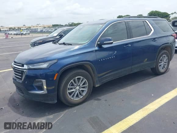 2023 Chevrolet Traverse LT Cloth with VIN 1GNERGKW5PJ130969, listed as a IAAI auction lot 42643661 with 64,421 mi miles and . Bid and sale history available at DreamBid. Image 2.