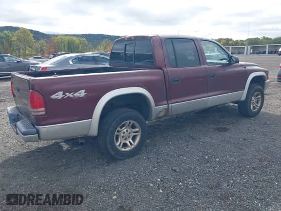 2003 Dodge Dakota SLT z VIN 1D7HG48N43S134367, wystawiony jako IAAI lot #43455942 z przebiegiem 220 079 mil mil oraz . Historia ofert i sprzedaży dostępna na DreamBid. Obrazek 4.