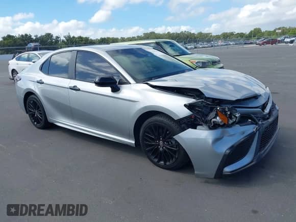 2021 Toyota Camry SE with VIN 4T1G11AK2MU445593, listed as a IAAI auction lot 43385464 with 57,907 mi miles and . Bid and sale history available at DreamBid. Image 1.