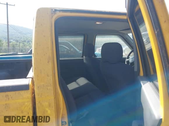 2003 Nissan Frontier XE z VIN 1N6ED29Y73C444734, wystawiony jako IAAI lot #42856079 z przebiegiem 163 764 mil mil oraz . Historia ofert i sprzedaży dostępna na DreamBid. Obrazek 8.