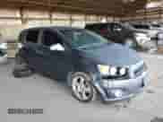 2014 Chevrolet Sonic LTZ with VIN 1G1JE6SB3E4216876, listed as a Copart auction lot 70568555 with 159,806 mi miles and Salvage title. Bid and sale history available at DreamBid. Image 4.