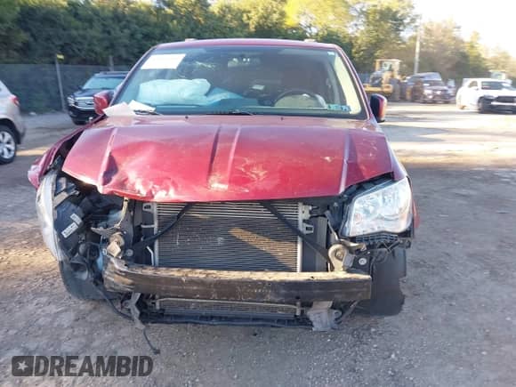 2016 Dodge Grand Caravan SXT with VIN 2C4RDGCG4GR161335, listed as a IAAI auction lot 43414142 with 124,679 mi miles and . Bid and sale history available at DreamBid. Image 13.