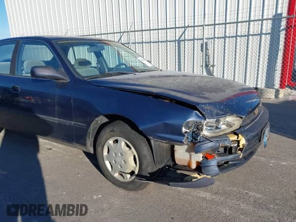 1994 Toyota Camry LE z VIN 4T1SK12EXRU374215, wystawiony jako IAAI lot #41581093 z przebiegiem 80 397 mil mil oraz . Historia ofert i sprzedaży dostępna na DreamBid. Obrazek 6.