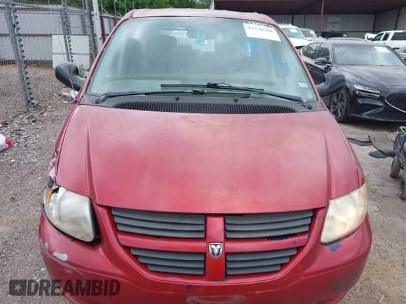 2005 Dodge Caravan SXT with VIN 1D4GP45R05B104057, listed as a IAAI auction lot 42330306 with 185,469 mi miles and . Bid and sale history available at DreamBid. Image 13.