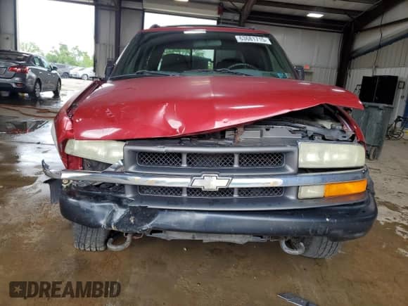2004 Chevrolet S-10 LS z VIN 1GCDT13X44K141199, wystawiony jako Copart lot #63681715 z przebiegiem 125 327 mil mil oraz Szkoda całkowita • Salvage title. Historia ofert i sprzedaży dostępna na DreamBid. Obrazek 5.