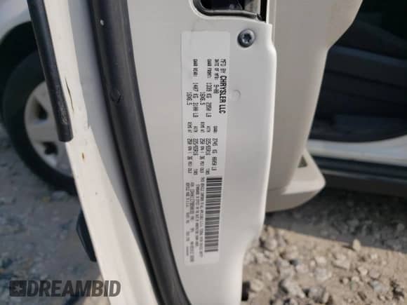 2009 Dodge Caravan with VIN 1D4HN11E79B508183, listed as a Copart auction lot 57297734 with 135,651 mi miles and Salvage title. Bid and sale history available at DreamBid. Image 13.