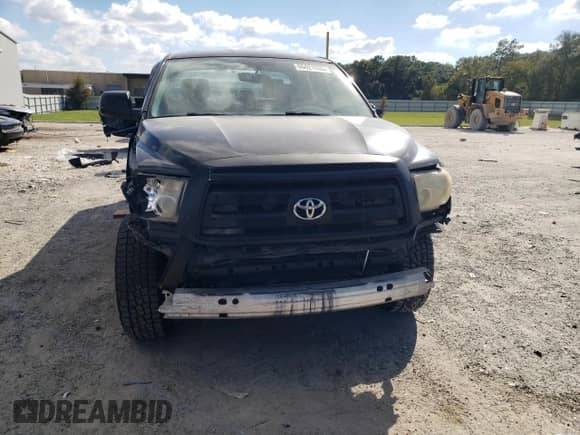 2012 Toyota Tundra с VIN 5TFRU5F17CX026275, выставлен на аукционе Copart как лот 86421535 с пробегом 157 606 миль миль и Списание • Salvage title. История ставок и продаж доступна на DreamBid. Изображение 5.
