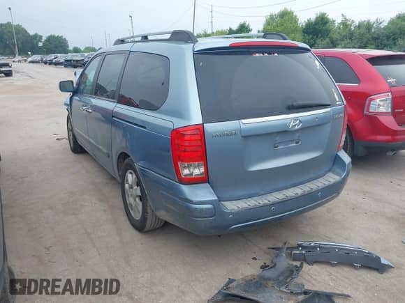 2007 Hyundai Entourage GLS with VIN KNDMC233676013319, listed as a IAAI auction lot 42663094 with 209,578 mi miles and . Bid and sale history available at DreamBid. Image 3.