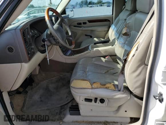 2002 Cadillac Escalade с VIN 1GYEK63N42R132049, выставлен на аукционе Copart как лот 57876755 с пробегом 143 979 миль миль и Списание • Salvage title. История ставок и продаж доступна на DreamBid. Изображение 7.