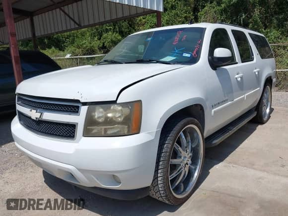 2007 Chevrolet Suburban LTZ with VIN 3GNFK16377G101075, listed as a IAAI auction lot 43025258 with Not provided miles and . Bid and sale history available at DreamBid. Image 2.