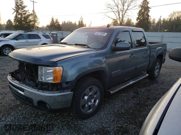 2010 GMC Sierra 1500 SLT z VIN 3GTRKWE23AG219711, wystawiony jako Copart lot #82776894 z przebiegiem 112 675 mil mil oraz Szkoda całkowita • Salvage title. Historia ofert i sprzedaży dostępna na DreamBid. Obrazek 1.