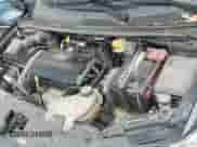 2014 Chevrolet Sonic LT z VIN 1G1JC5SH3E4105006, wystawiony jako IAAI lot #42975548 z przebiegiem 110 232 mil mil oraz . Historia ofert i sprzedaży dostępna na DreamBid. Obrazek 20.