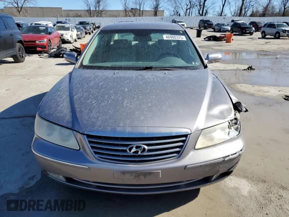2007 Hyundai Azera SE с VIN KMHFC46F17A183591, выставлен на аукционе Copart как лот 46900375 с пробегом 144 664 миль миль и Списание • Salvage title. История ставок и продаж доступна на DreamBid. Изображение 5.